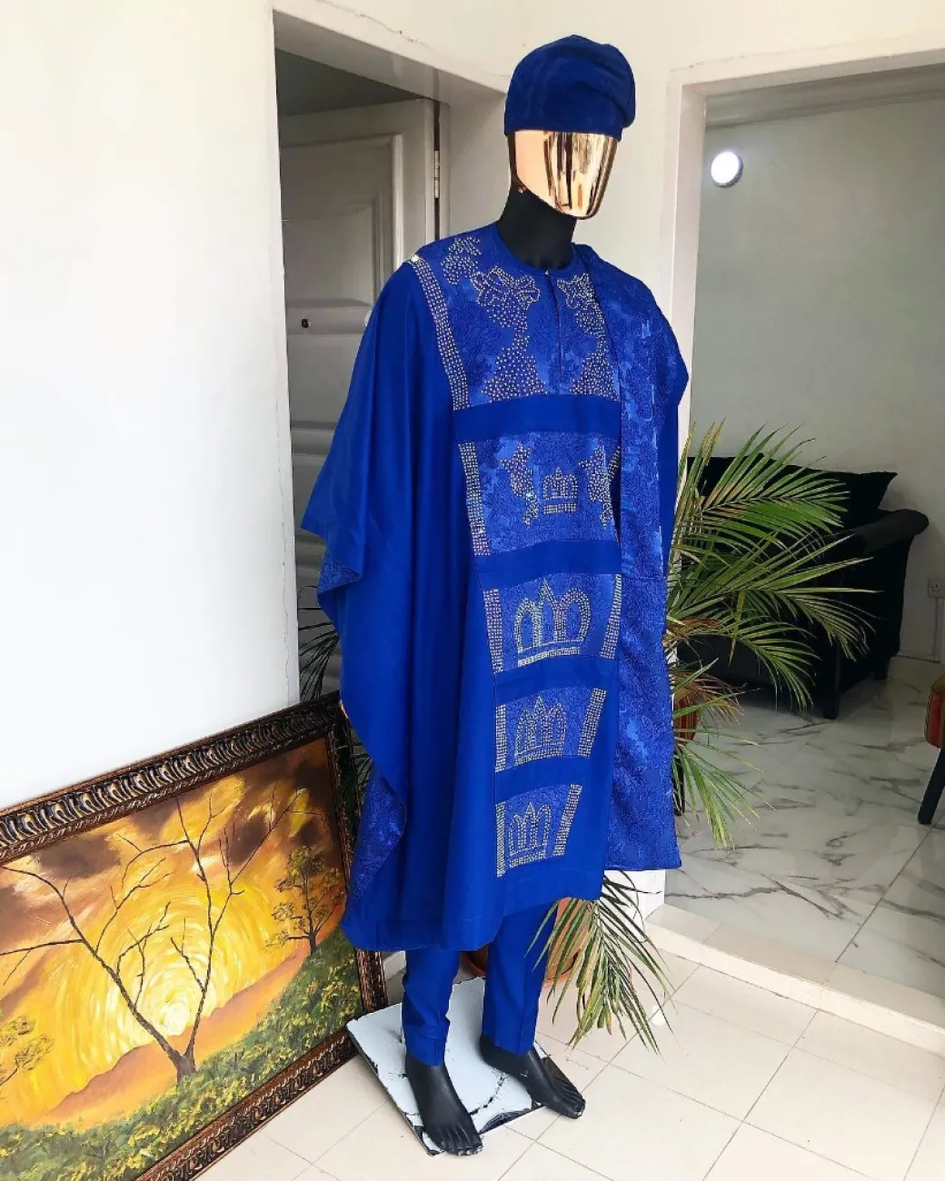 A Royal blue with swarovski on jacquard detailing matching hand wooven embroidery agbada