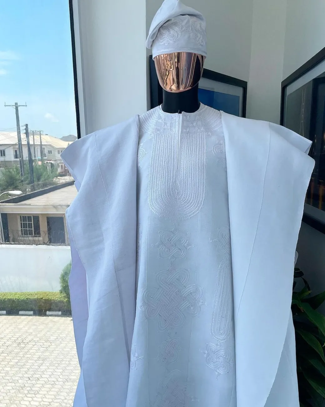 A Royal monochrome cocaine white African traditional agbada.