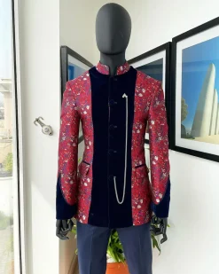A Royal Navy blue, white and red splashed Mandarin Jacquard safari tuxedo royal suit