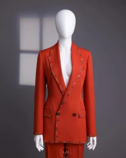 A rust orange peak lapel with shades of brown ss16 Swarovski stone details double-breasted jacket.