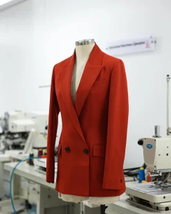 A Rust Orange Peak Lapel, Double-Breasted Jacket.