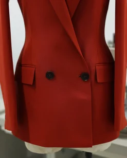 A Rust Orange Peak Lapel, Double-Breasted Jacket.