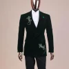 A Sacramento green “agama” soaked velvet peak lapel single button double breasted suit