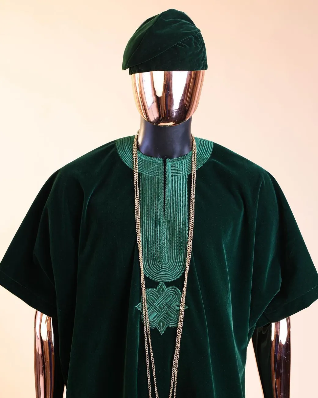 A Sacramento green daftan, sokoto & Fila Yoruba African native.