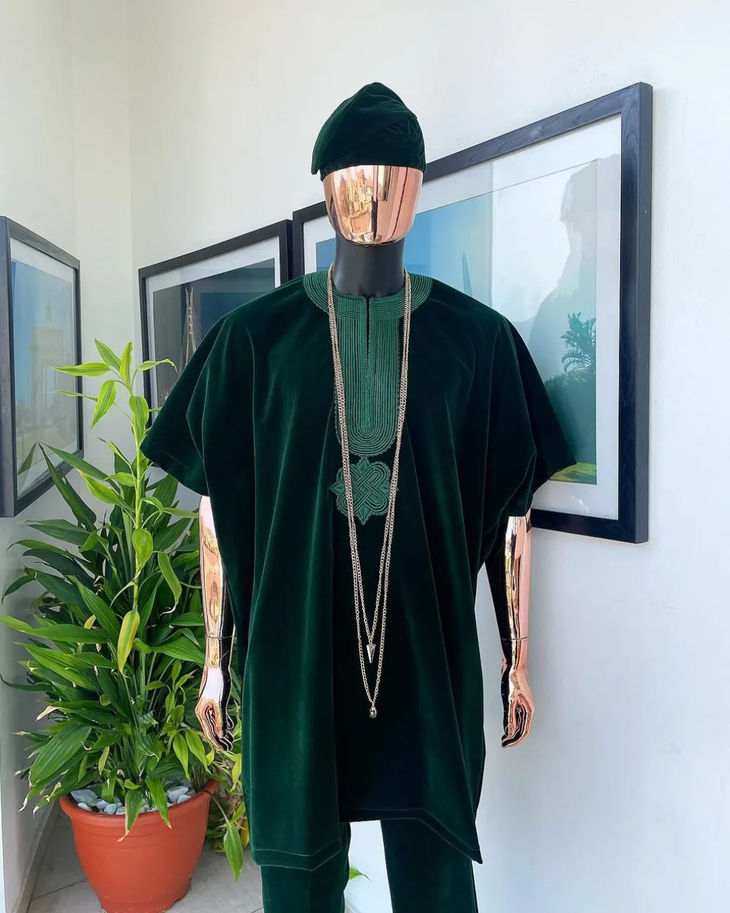 A Sacramento green daftan, sokoto & Fila Yoruba African native.