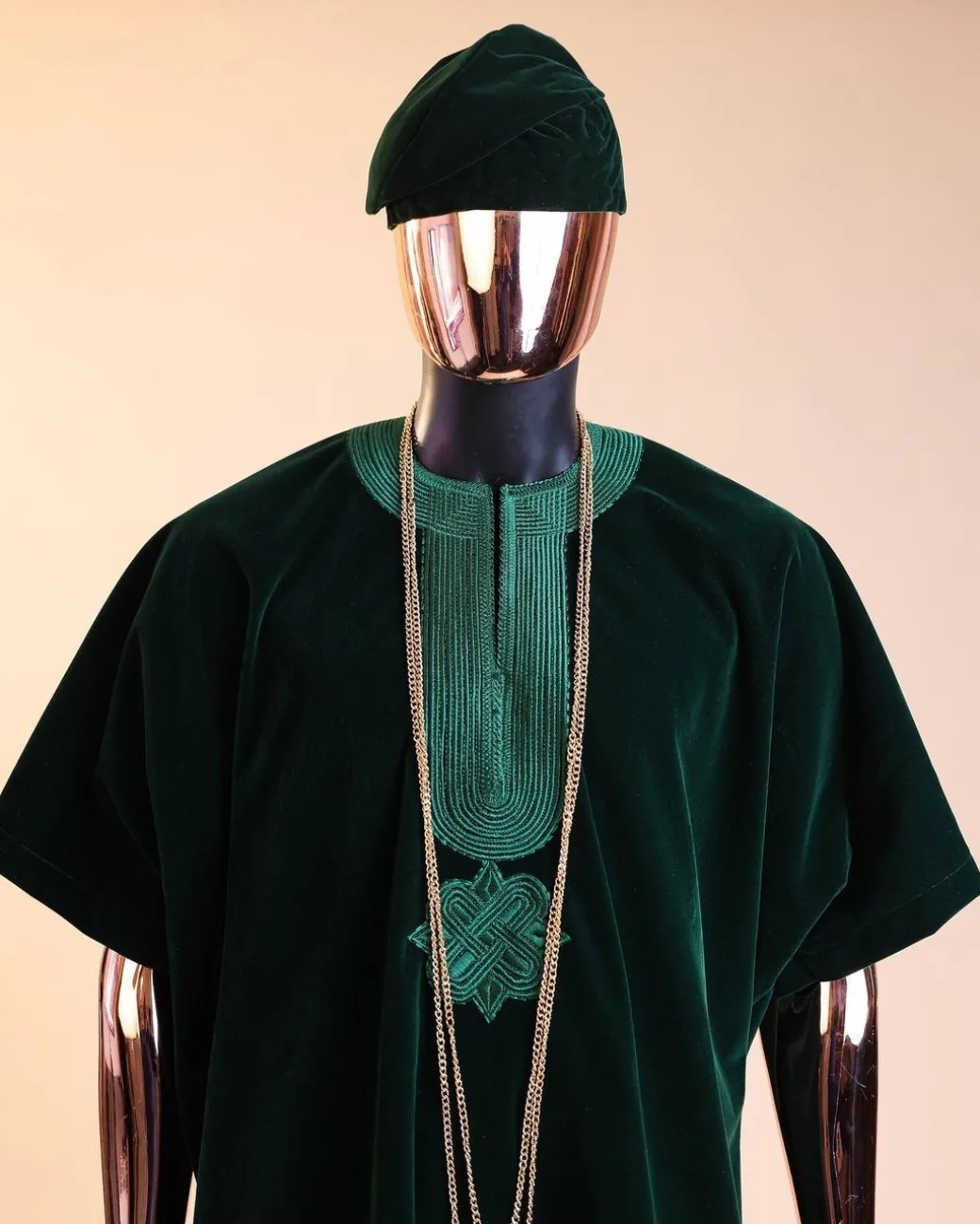 A Sacramento green daftan, sokoto & Fila Yoruba African native.