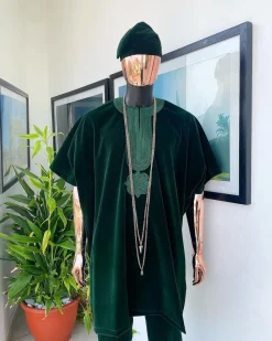 A Sacramento green daftan, sokoto & Fila Yoruba African native.