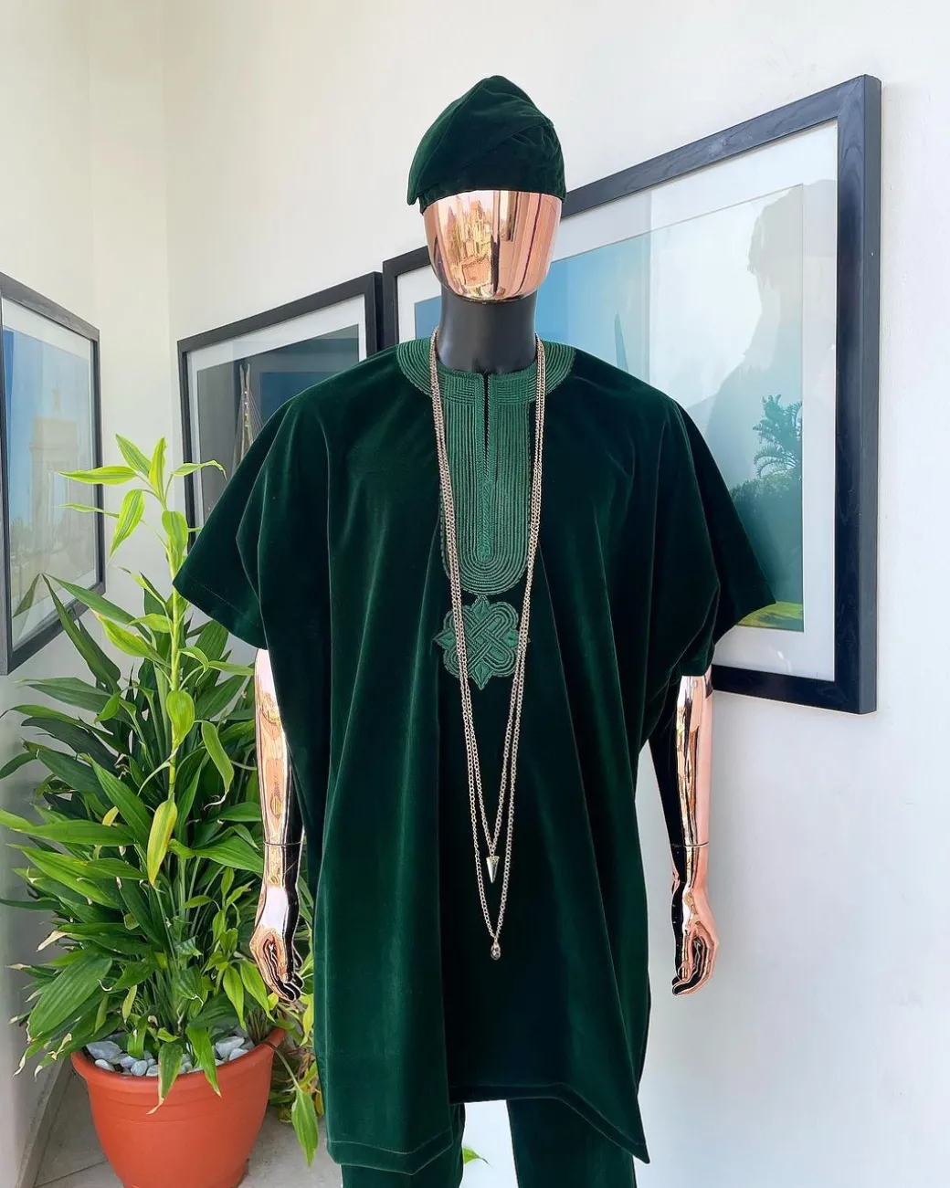 A Sacramento green daftan, sokoto & Fila Yoruba African native.