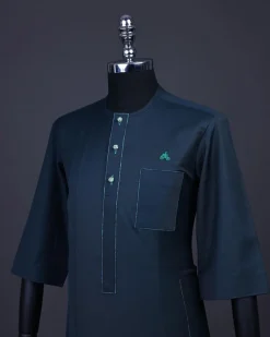 A Sacramento green, Front flap with green Swarovski buttons, patch pocket, 3/4 sleeve details African senator kaftan native.