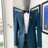 A Sacramento Green Peak Lapel, One Button Tuxedo Suit