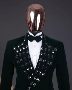 A Sacramento green soaked velvet peak lapel single button double breasted suit