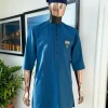 A sapphire blue, front flap, embroidery square rectangle flap and pocket design African traditional senator kaftan native.
