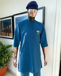 A sapphire blue, front flap, embroidery square rectangle flap and pocket design African traditional senator kaftan native.
