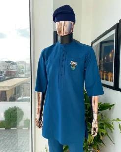 A sapphire blue, front flap, embroidery square rectangle flap and pocket design African traditional senator kaftan native.