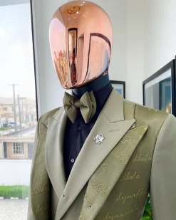 A “scritto” (inscribe your name) dark olive green, layered 4 lapel suit