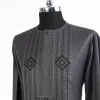 A Shadow Grey, front flap with connected cube, black Swarovski button and stones detailing african traditional senator kaftan native.
