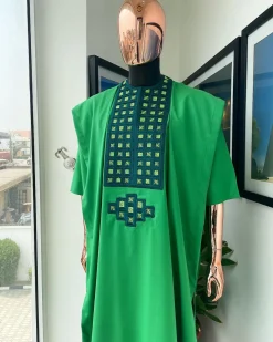 A Shamrock green, connected square embroidery design with matching silver and parakeet green Swarovski stone details agbada
