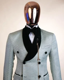 A shawl lapel, Double breathed, pick stitched splashed navy mint green, cream metallic jacquard tuxedo suit
