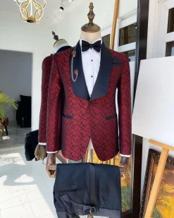 A Shawl lapel jacquard patterned burgundy tuxedo suit