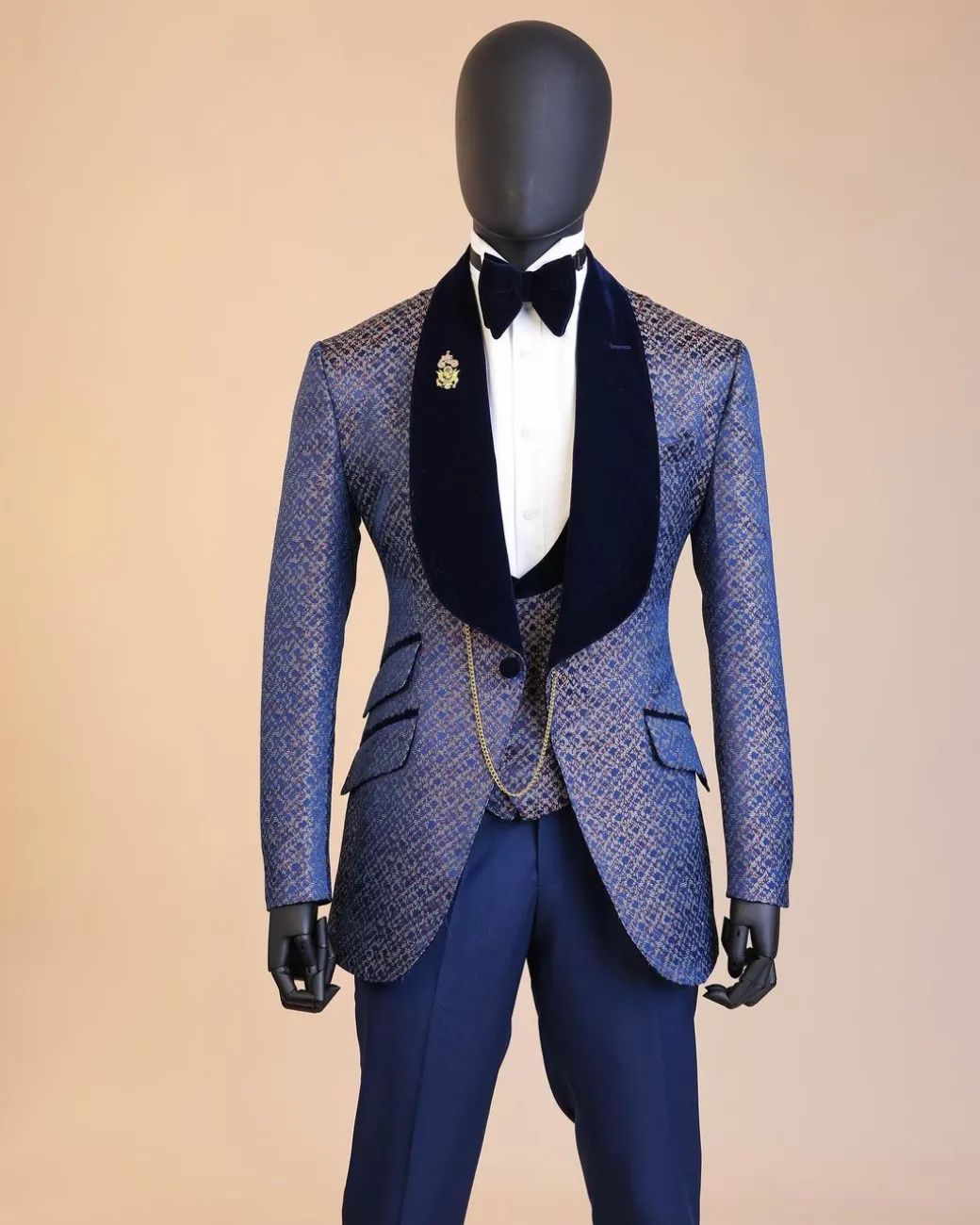 A shawl lapel, splashed navy blue, orange and silver metallic jacquard tuxedo suit
