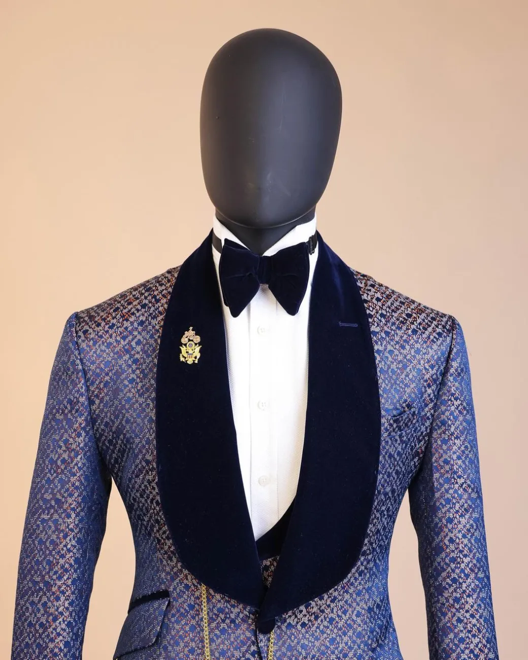 A shawl lapel, splashed navy blue, orange and silver metallic jacquard tuxedo suit