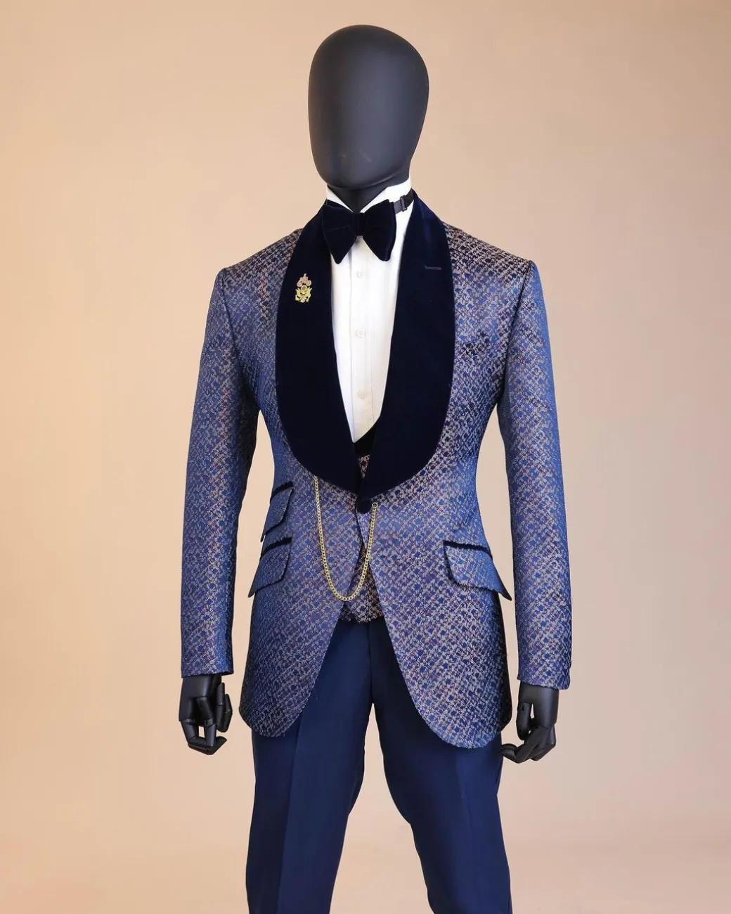 A shawl lapel, splashed navy blue, orange and silver metallic jacquard tuxedo suit