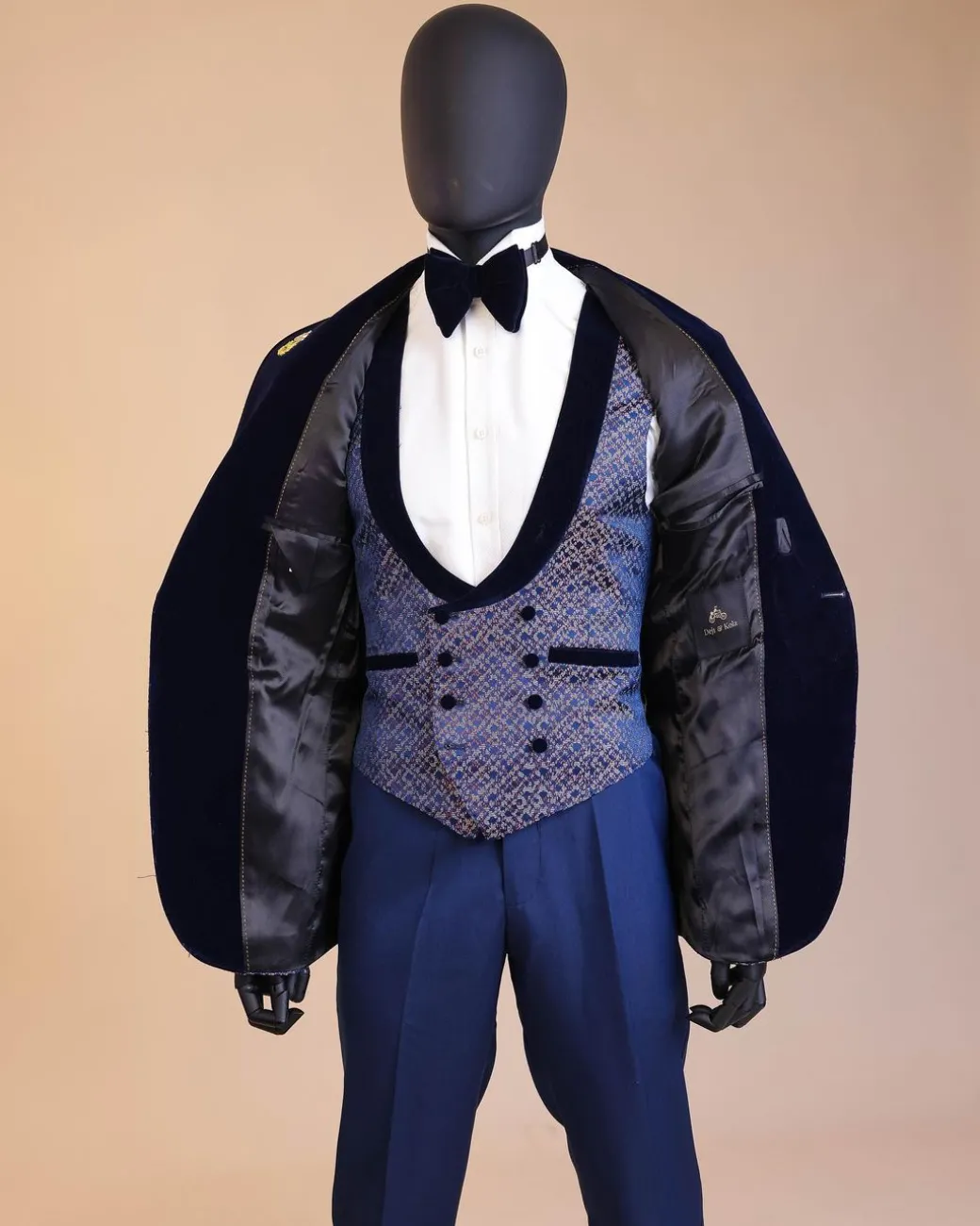 A shawl lapel, splashed navy blue, orange and silver metallic jacquard tuxedo suit