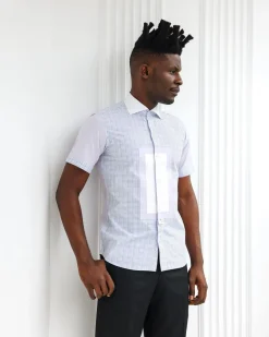A Short sleeve, boxed layered lilac and white, check casual shirt.