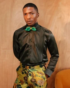A Silk, dark seaweed green, pleated tuxedo shirt.