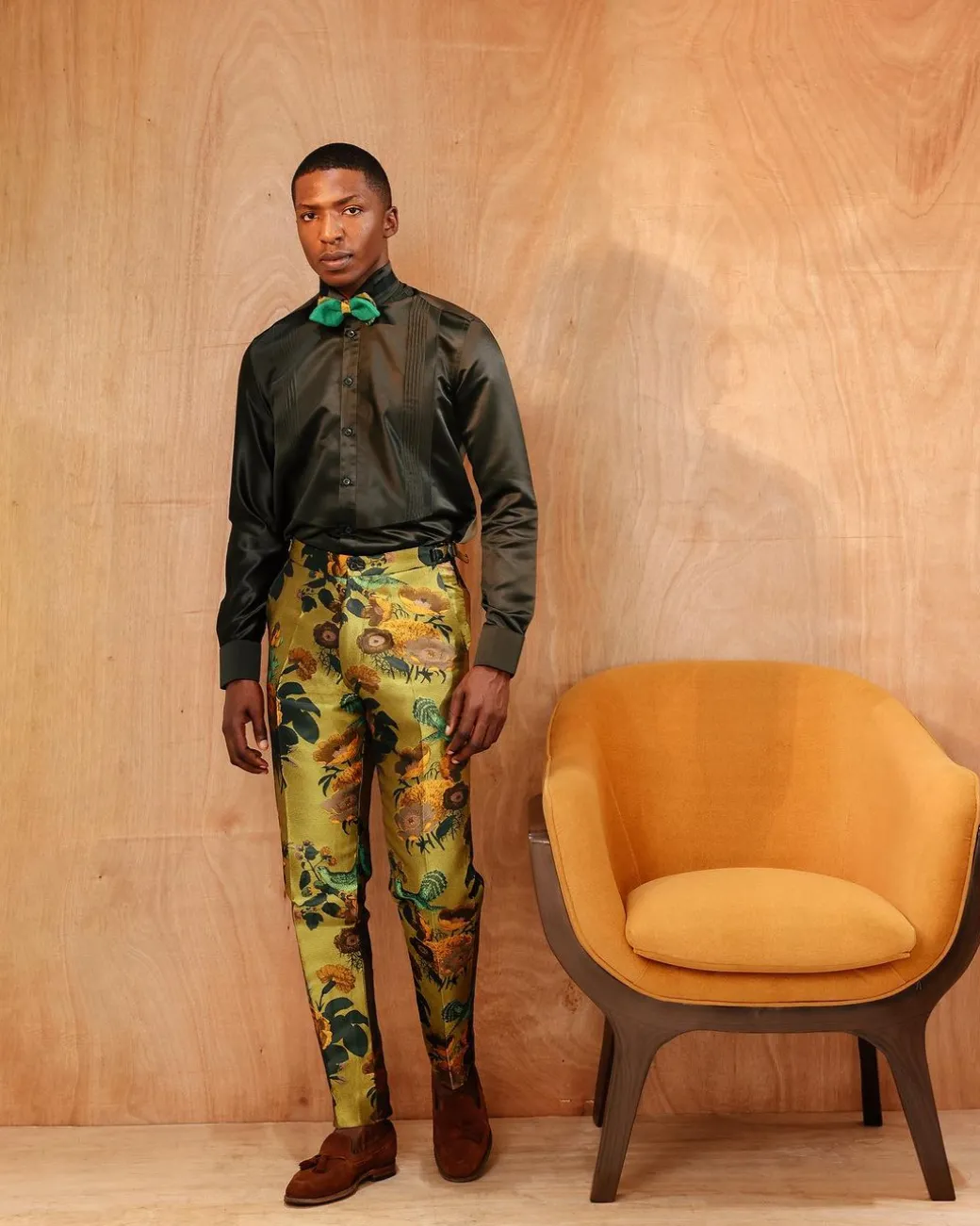 A Silk, dark seaweed green, pleated tuxedo shirt.