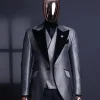 A Silver and black, knitted, jacquard peak lapel tuxedo suit