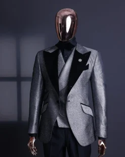 A Silver and black, knitted, jacquard peak lapel tuxedo suit