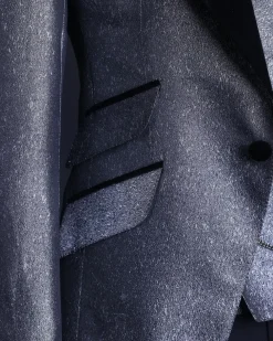 A Silver and black, knitted, jacquard peak lapel tuxedo suit