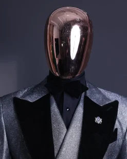 A Silver and black, knitted, jacquard peak lapel tuxedo suit