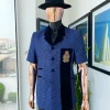 A Sky Blue And Splash Of Navy Blue Floral Jacquard Notch Lapel, Short-Sleeve Safari Suit