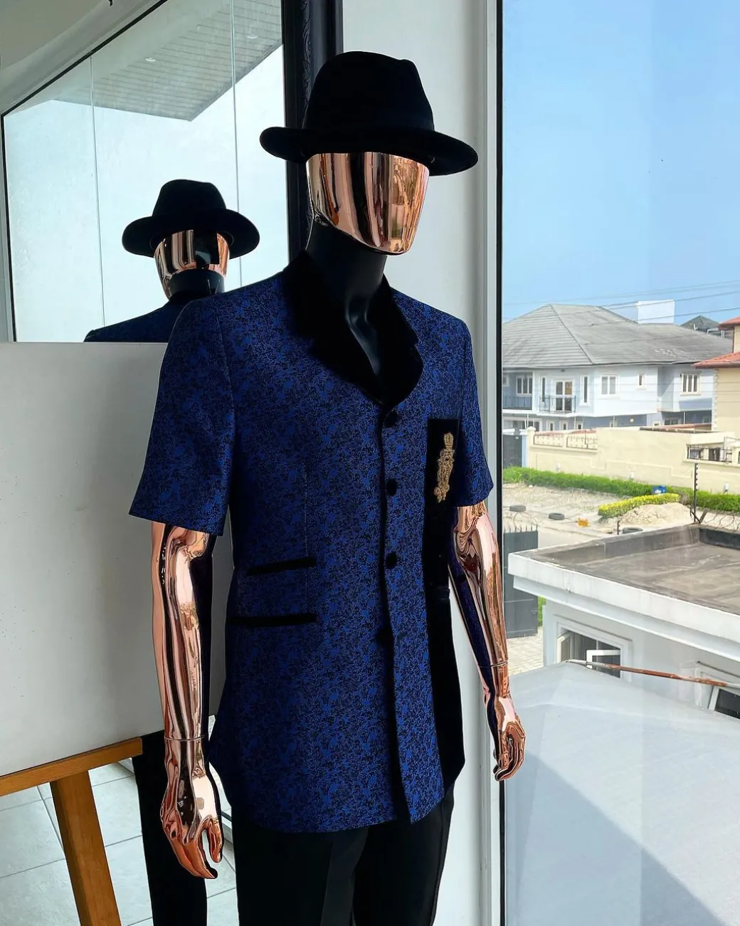 A Sky Blue And Splash Of Navy Blue Floral Jacquard Notch Lapel, Short-Sleeve Safari Suit