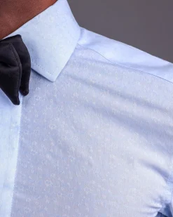A Sky Blue, Covered Button, Connected Paisley Print Tuxedo Shirt.