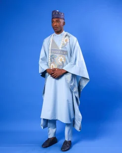 A sky blue galactical embroidery with gold and blue print jacquard details agbada