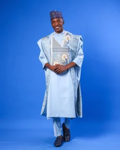 A sky blue galactical embroidery with gold and blue print jacquard details agbada