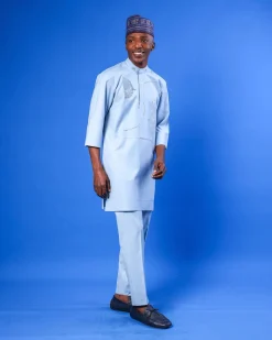 A sky blue galactical embroidery with gold and blue print jacquard details agbada