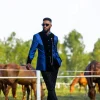 A Skye blue and Navy blue Mandarin Jacquard safari tuxedo royal suit