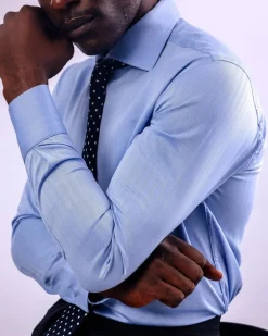 A Skye blue, herringbone fabric, cut away collar business shirt.