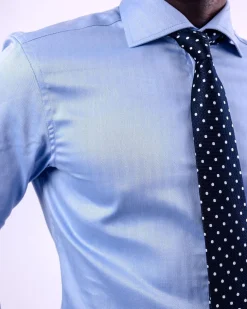 A Skye blue, herringbone fabric, cut away collar business shirt.