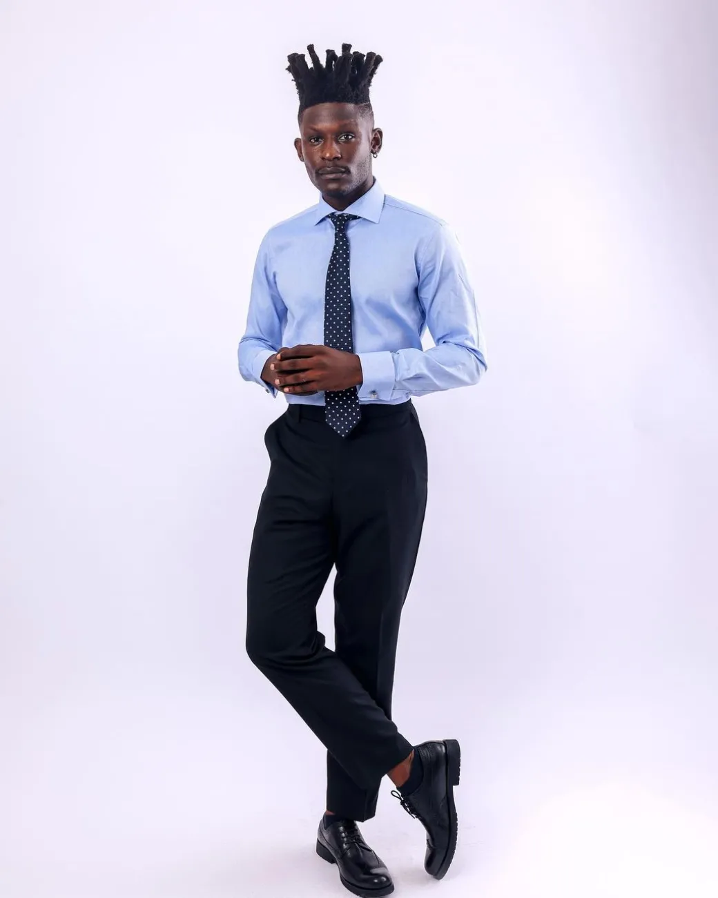 A Skye blue, herringbone fabric, cut away collar business shirt.