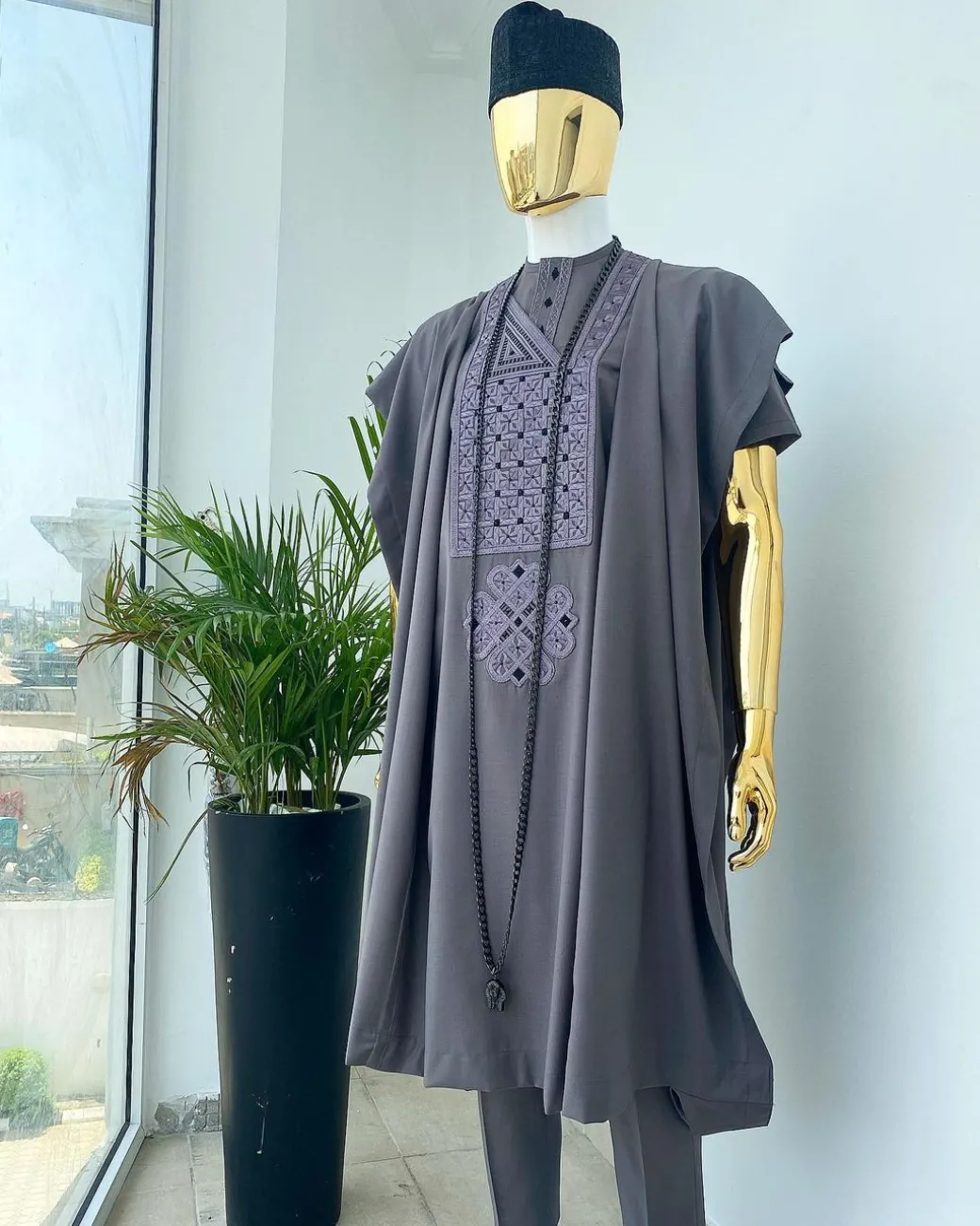 A space grey with black and Grey dotted embroidery design Agbada