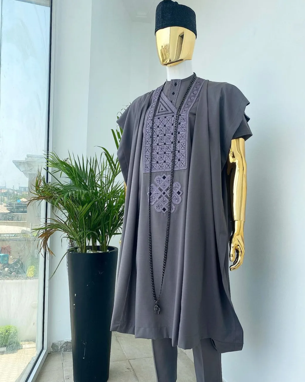 A space grey with black and Grey dotted embroidery design Agbada