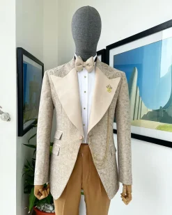 A splash of tortilla and wheat brown peak lapel metallic jacquard tuxedo suit