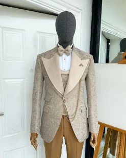 A splash of tortilla and wheat brown peak lapel metallic jacquard tuxedo suit
