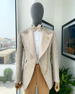 A splash of tortilla and wheat brown peak lapel metallic jacquard tuxedo suit
