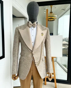 A splash of tortilla and wheat brown peak lapel metallic jacquard tuxedo suit
